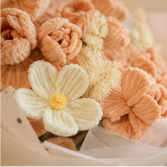 Close-up of the Ivory Serenity handmade chenille bouquet, showing textured peach and ivory flowers with soft filler.