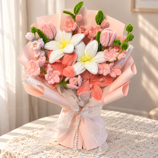 Blush Romance handmade chenille bouquet with white and coral flowers, pink buds and blush wrapping in natural window light.
