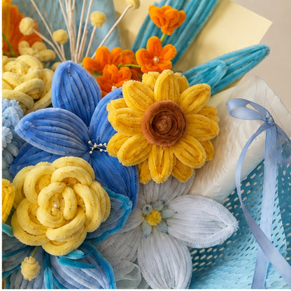 Close-up of the Graduation Cheer handmade chenille bouquet, showing textured blue, yellow, white and orange flowers.