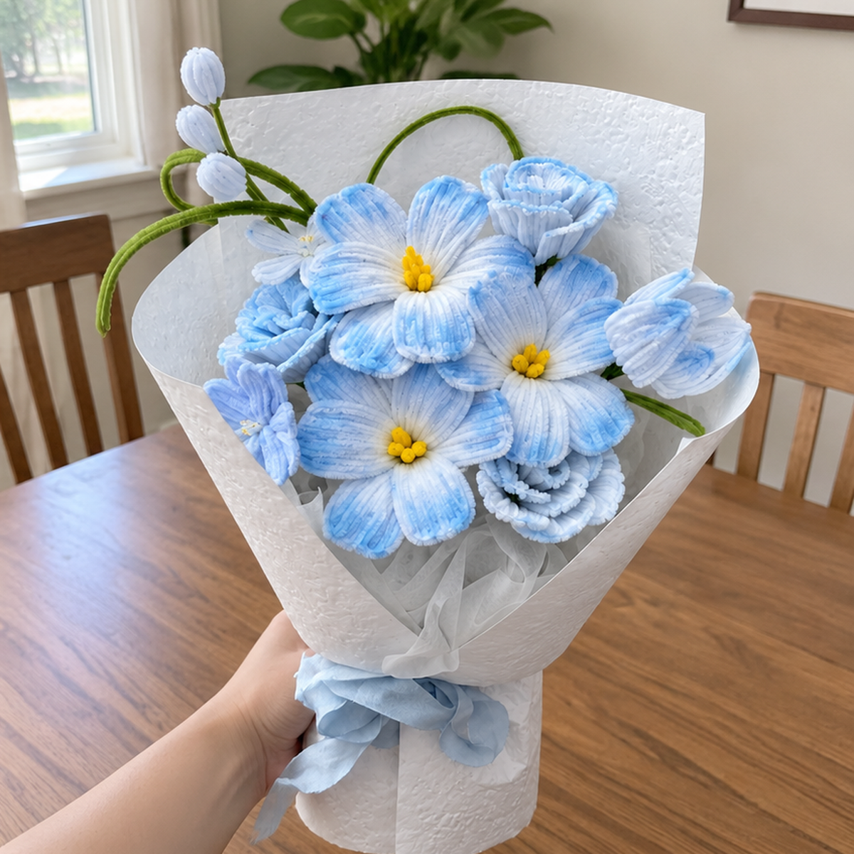 Powder Blue Wishes held naturally in a home gifting setting.