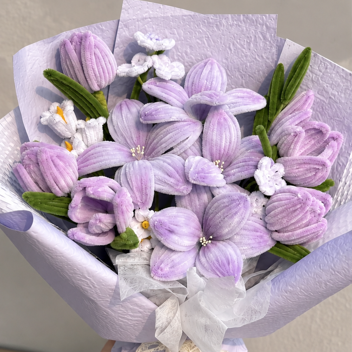 Lilac Cloud close-up showing handmade chenille flower texture, wrapping folds and ribbon details.