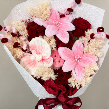 Roseberry Charm close-up showing handmade chenille flower texture, wrapping folds and ribbon details.