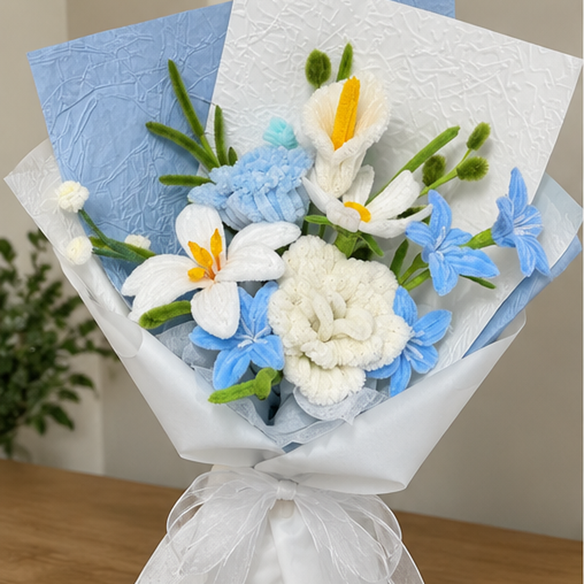 Azure Lily close-up showing handmade chenille flower texture, wrapping folds and ribbon details.