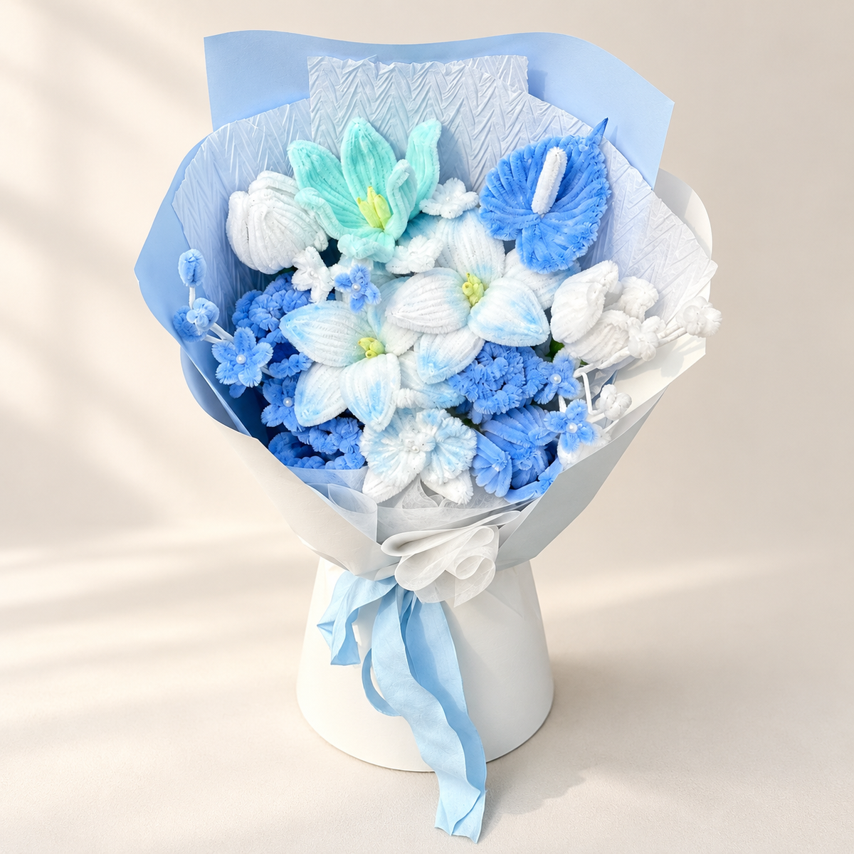 Blue Frost handmade chenille flower bouquet in its finished decorative wrapping.