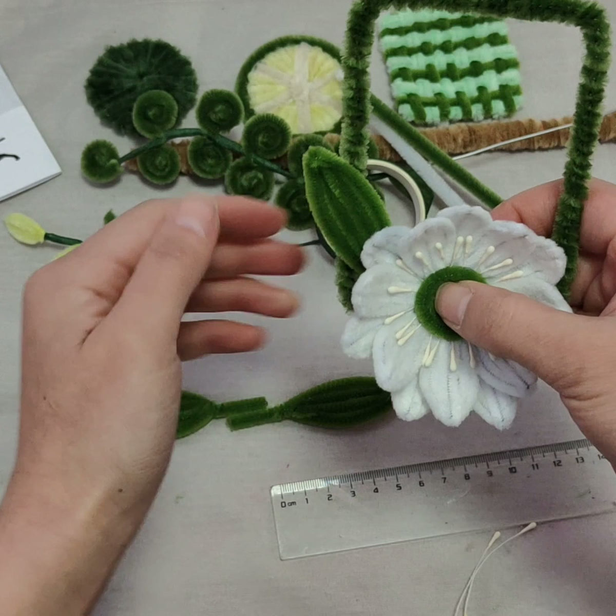 White mini lotus shown in the handmade flower lesson
